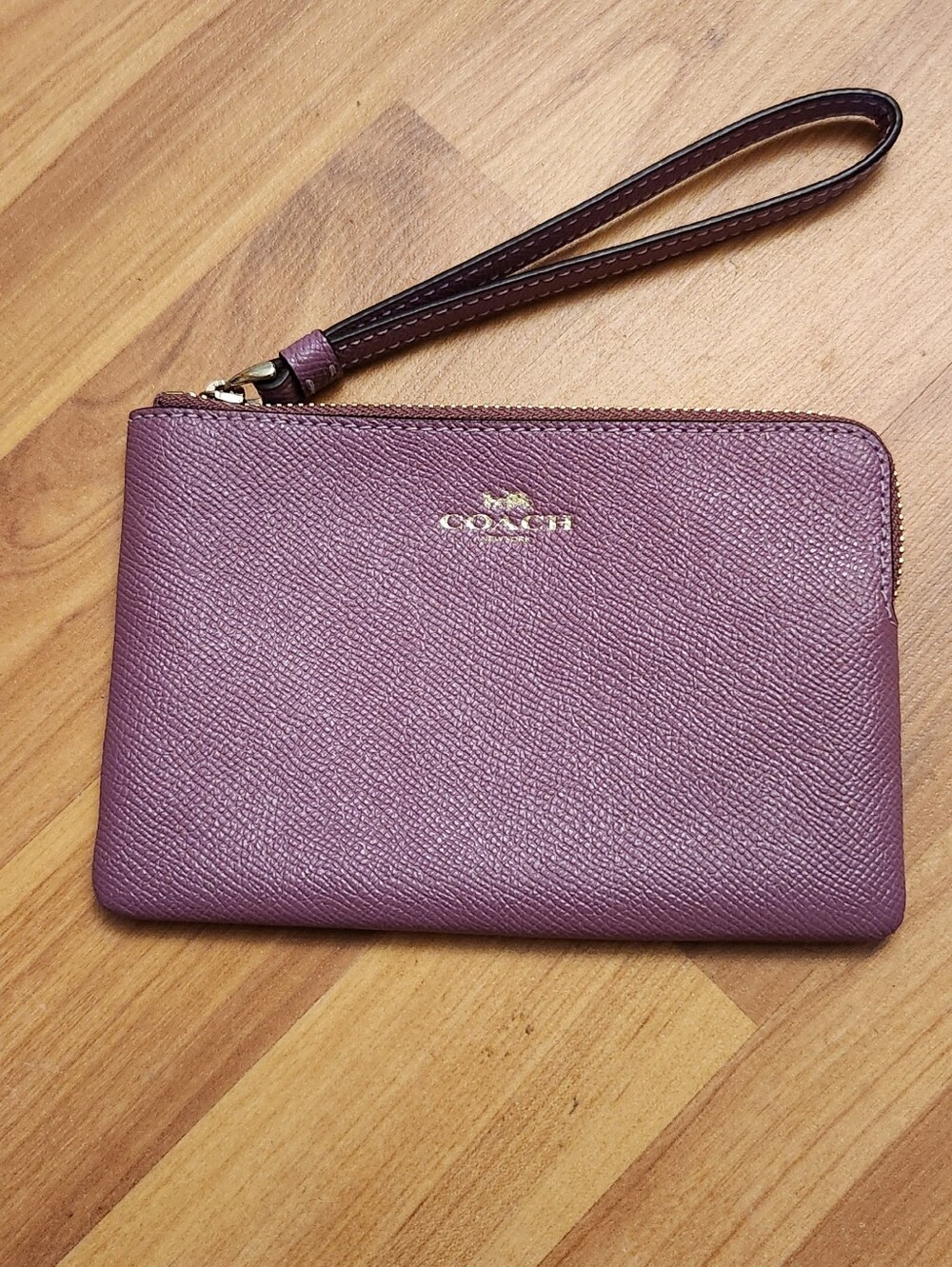 Coach Pebbled Leather Wristlet in Mauve